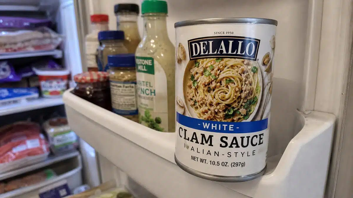 AI product-style photo of DeLallo Clam Sauce White for best canned clam sauce