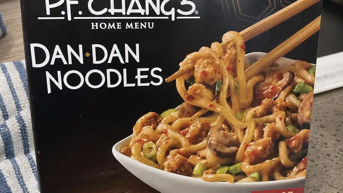 AI product-style photo of P.F. Chang's Home Menu Dan Dan Noodles for best frozen chinese meals