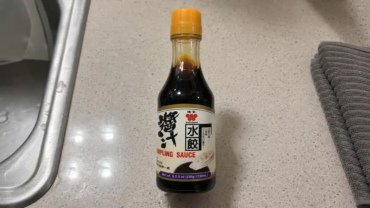 AI product-style photo of Wei-Chuan Hot Dumpling Sauce for best dumpling sauce