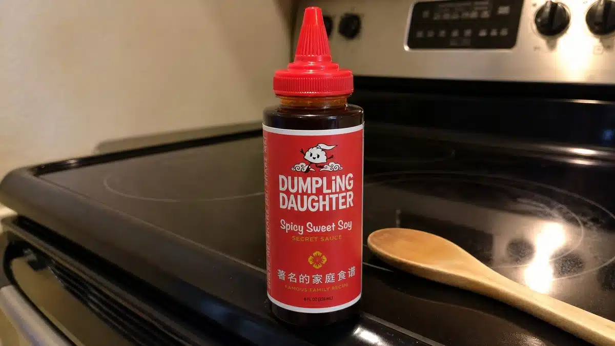 AI product-style photo of Dumpling Daughter Spicy Sweet Soy for best dumpling sauce