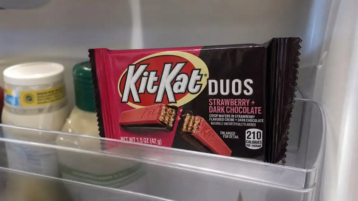 AI product-style photo of KIT KAT DUOS Strawberry and Dark Chocolate Wafer Candy Bars for best kit kat flavors