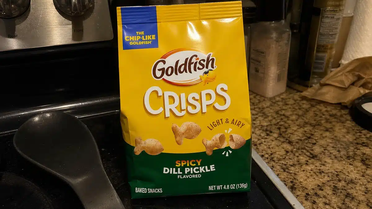 AI product-style photo of Goldfish Crisps Spicy Dill Pickle for best pickle flavored snacks